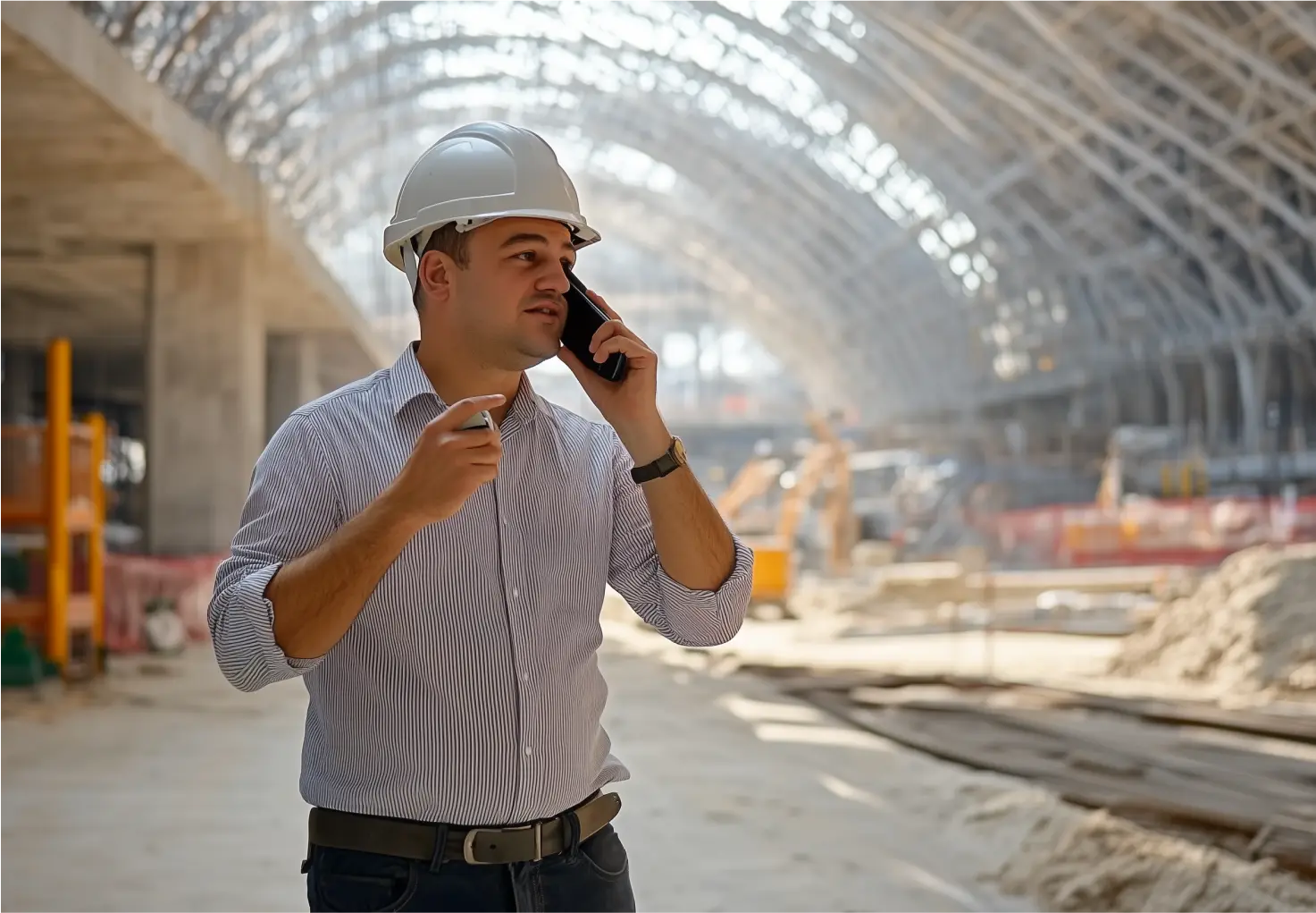 Man with helmet having a phone call